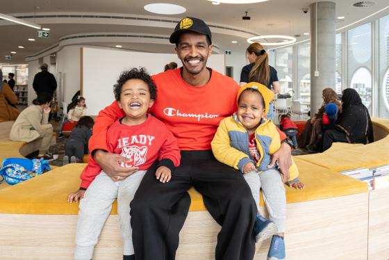 A dad with his two children